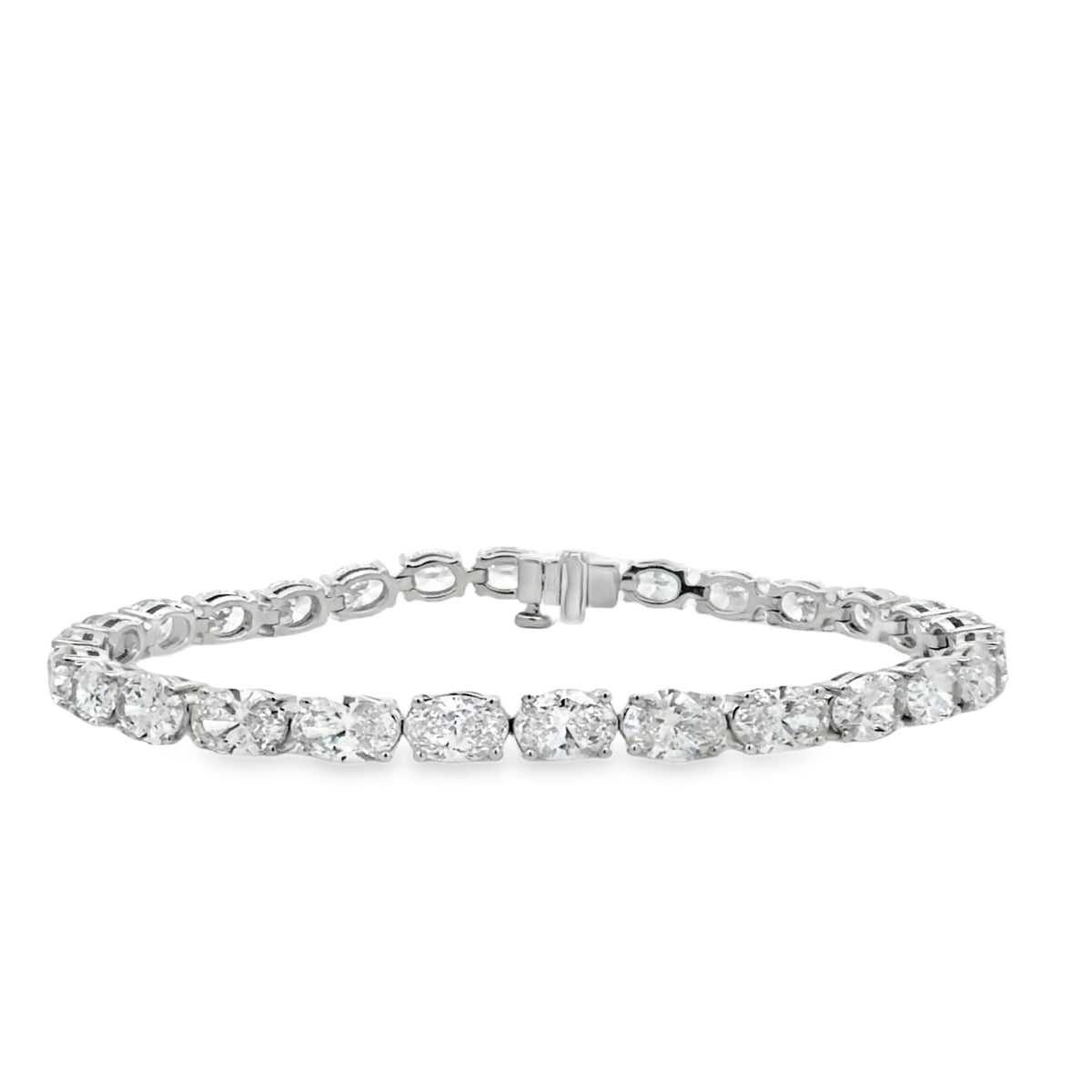 18KW OVAL CUT DIAMOND TENNIS BRACELET