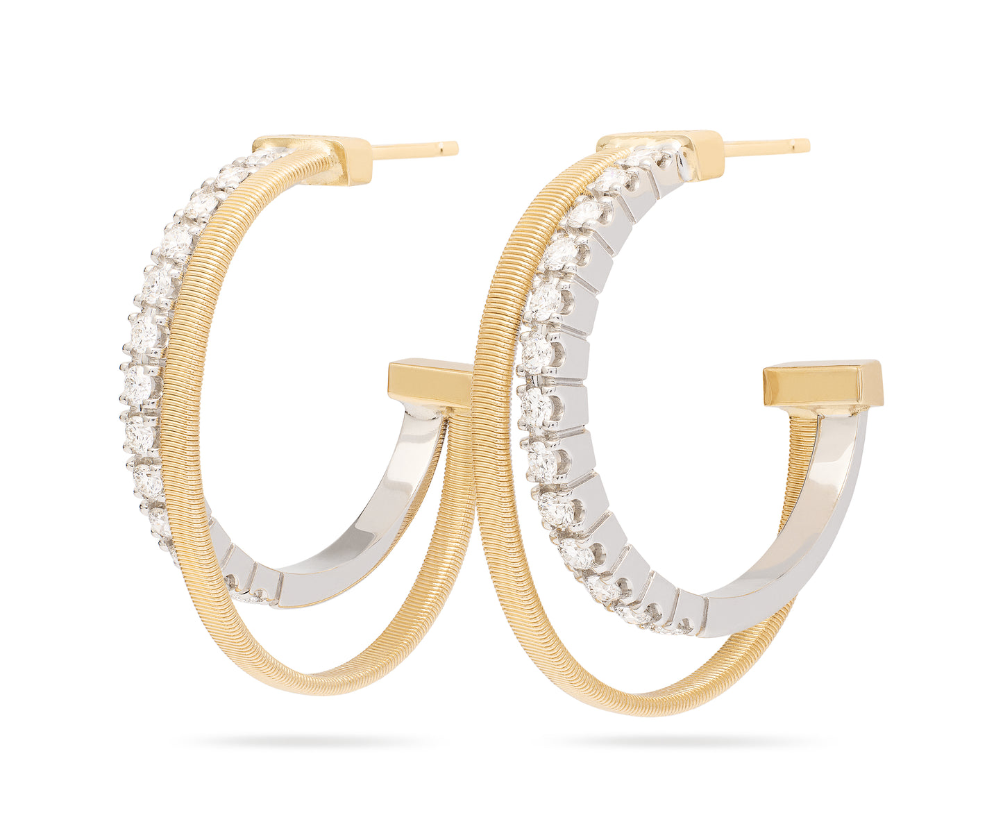Handcrafted in 18K yellow gold, these hoop earrings are carefully created with the exclusive coil technique. The flat coil hoop is embellished by a side hoop of brilliant-cut diamonds. Perfect for adding a touch of light to any outfit.