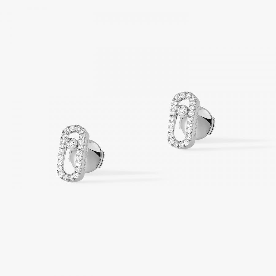 These pavé earrings in 18 karat white gold are part of Move, the signature collection of the Maison Messika.