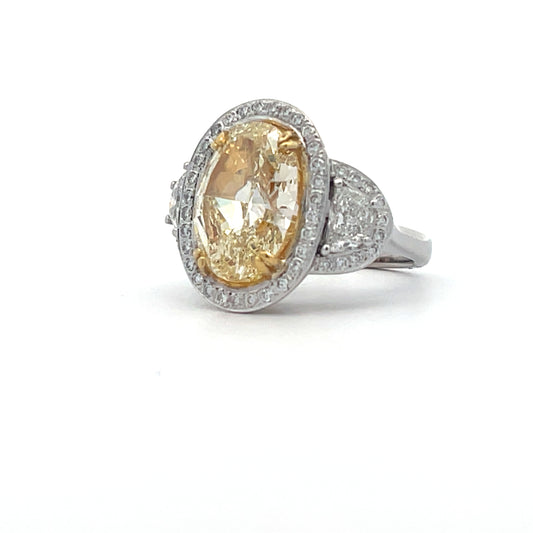 18KWY OVAL FANCY YELLOW COCKTAIL RING