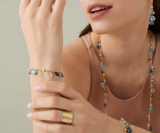 MARCO BICEGO 18KY PARADISE MIXED TOPAZ SINGLE STRAND BRACELET