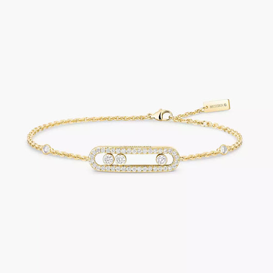 This pavé bracelet in 18 karat yellow gold is part of Move, the signature collection of the Maison Messika.
