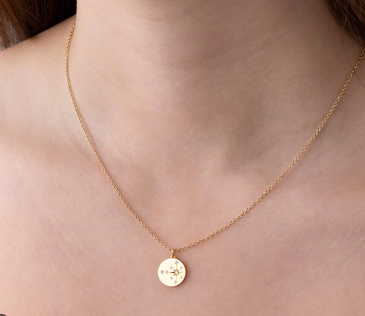 18KY LUNA STARBURST MEDALLION .05TWT