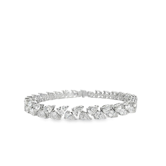18KW ALTERNATING PEAR SHAPE DIAMOND TENNIS BRACELET