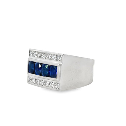 18KW MENS DIAMOND AND OVAL SAPPHIRE RING