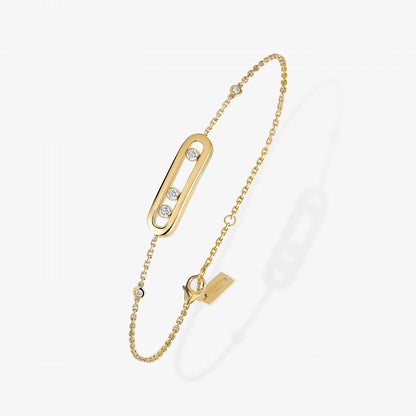 This bracelet in 18 karat yellow gold is part of Move, the signature collection of the Maison Messika.