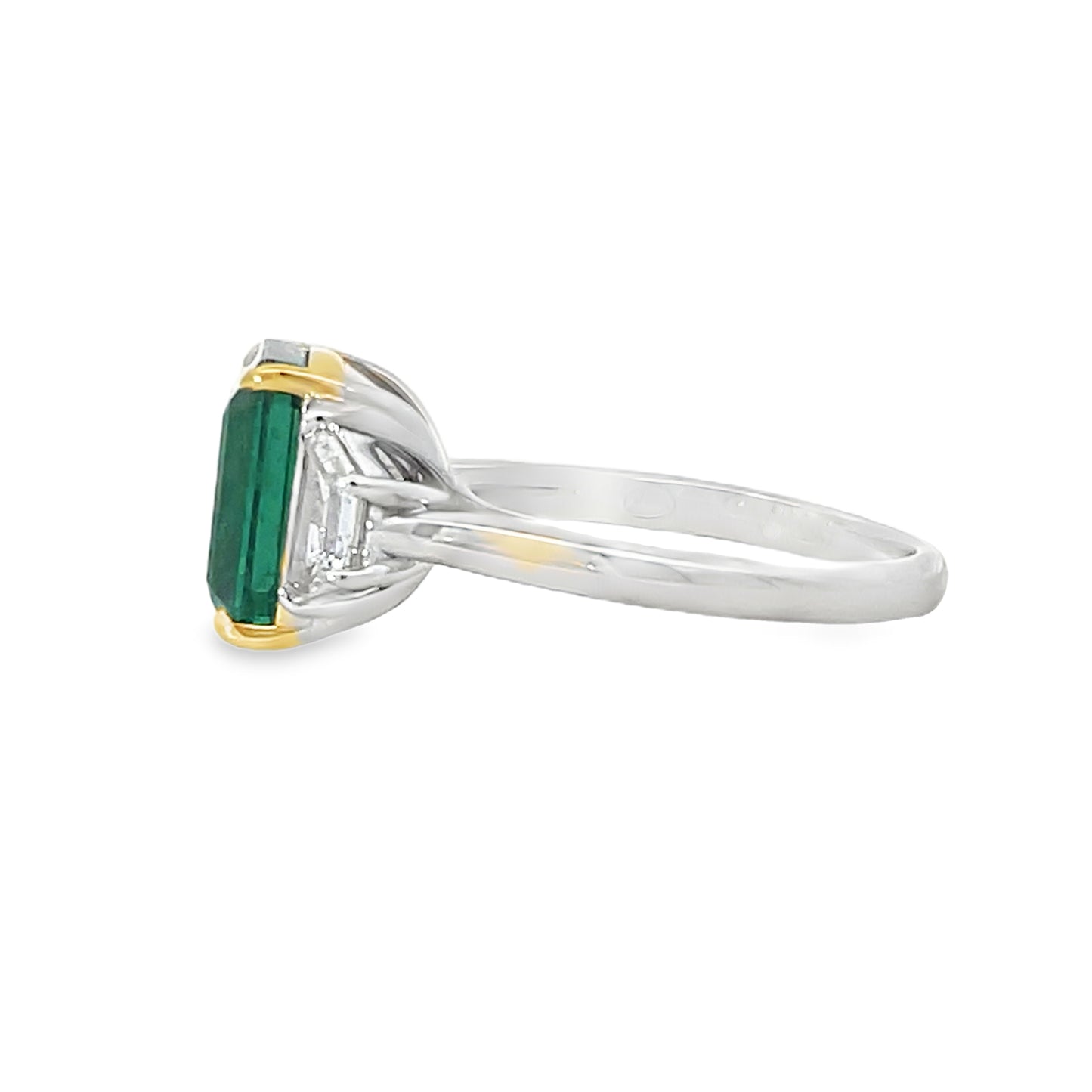 18KW EMERALD CUT EMERALD AND DIAMOND RING