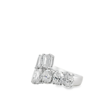 18KW EMERALD AND OVAL CUT DIAMOND BYPASS RING