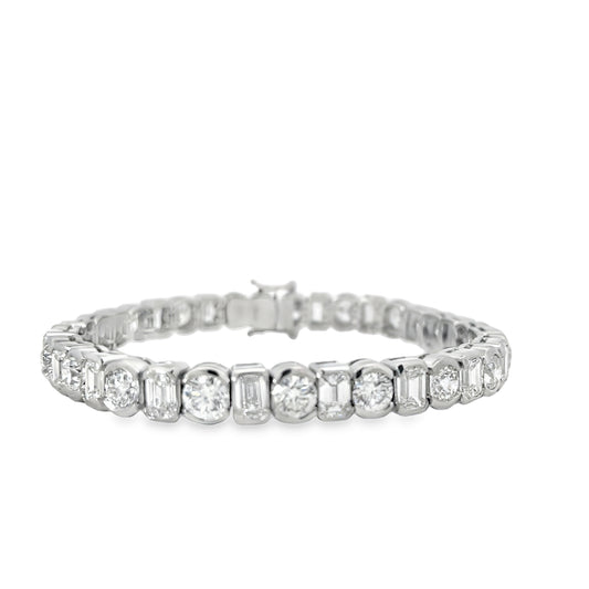 PLATINUM ROUND AND EMERALD CUT DIAMOND BRACELET
