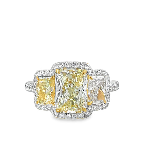 18KY WHITE AND YELLOW EMERAL CUT DIAMOND RING