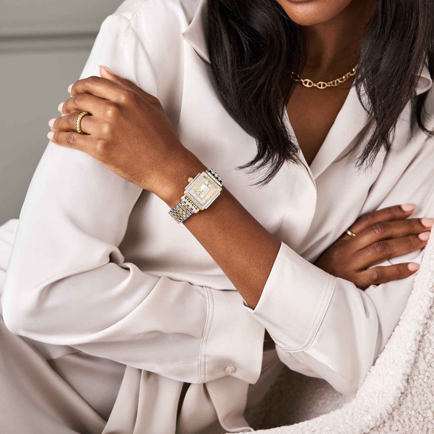 This two-tone Deco Madison Mid shines with 148 hand-set diamonds on the bezel and atop the silver white sunray dial. The two-tone bracelet is made specifically for the Deco Madison Mid collection and is interchangeable with any 16mm MICHELE strap.