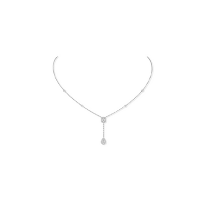 This necklace in 18 karat white gold is composed of two pear and emerald cut stones.