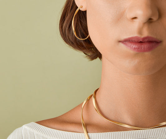 18KY MARRAKECH TWIST HOOP EARRS