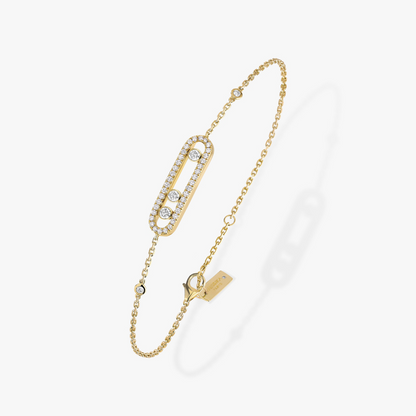 This pavé bracelet in 18 karat yellow gold is part of Move, the signature collection of the Maison Messika.