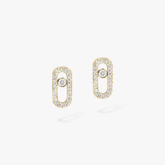 These pavé earrings in 18 karat yellow gold are part of Move, the signature collection of the Maison Messika.