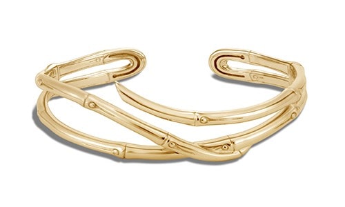 John Hardy gold bracelet sporting the brand’s signature textured metalwork