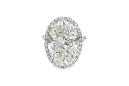 A Weston Signature halo engagement ring with an oval center stone, available at Weston Jewelers.