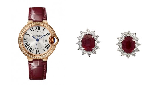 a rose gold watch with a maroon strap next to ruby halo earrings